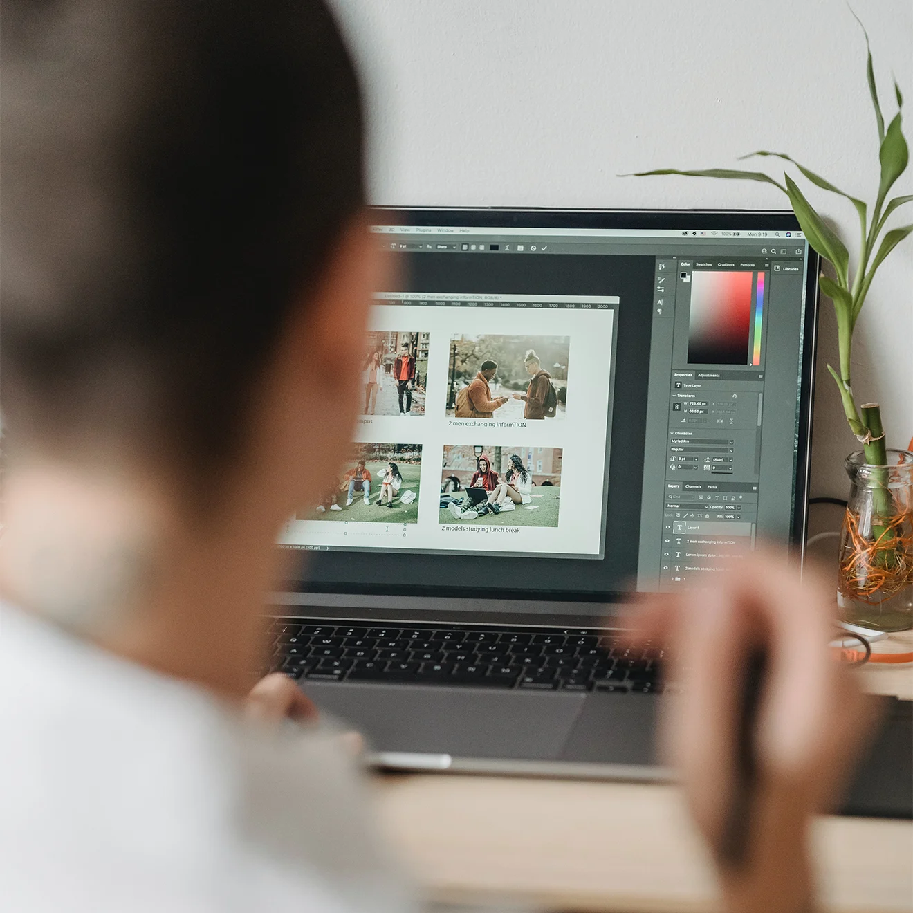 Designer editing brand photography and color palettes on a laptop screen