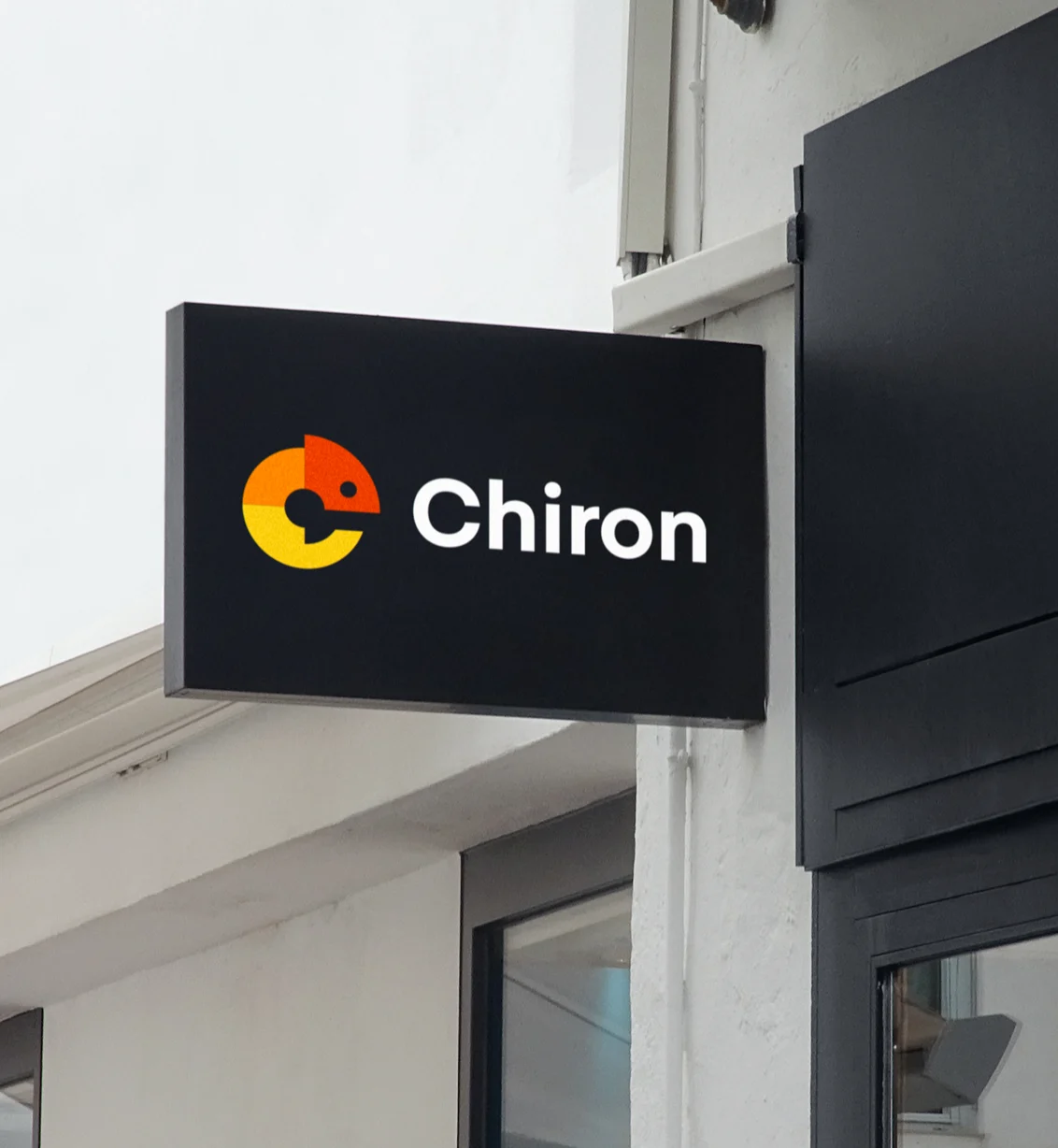 Chiron logo on illuminated storefront signage mockup