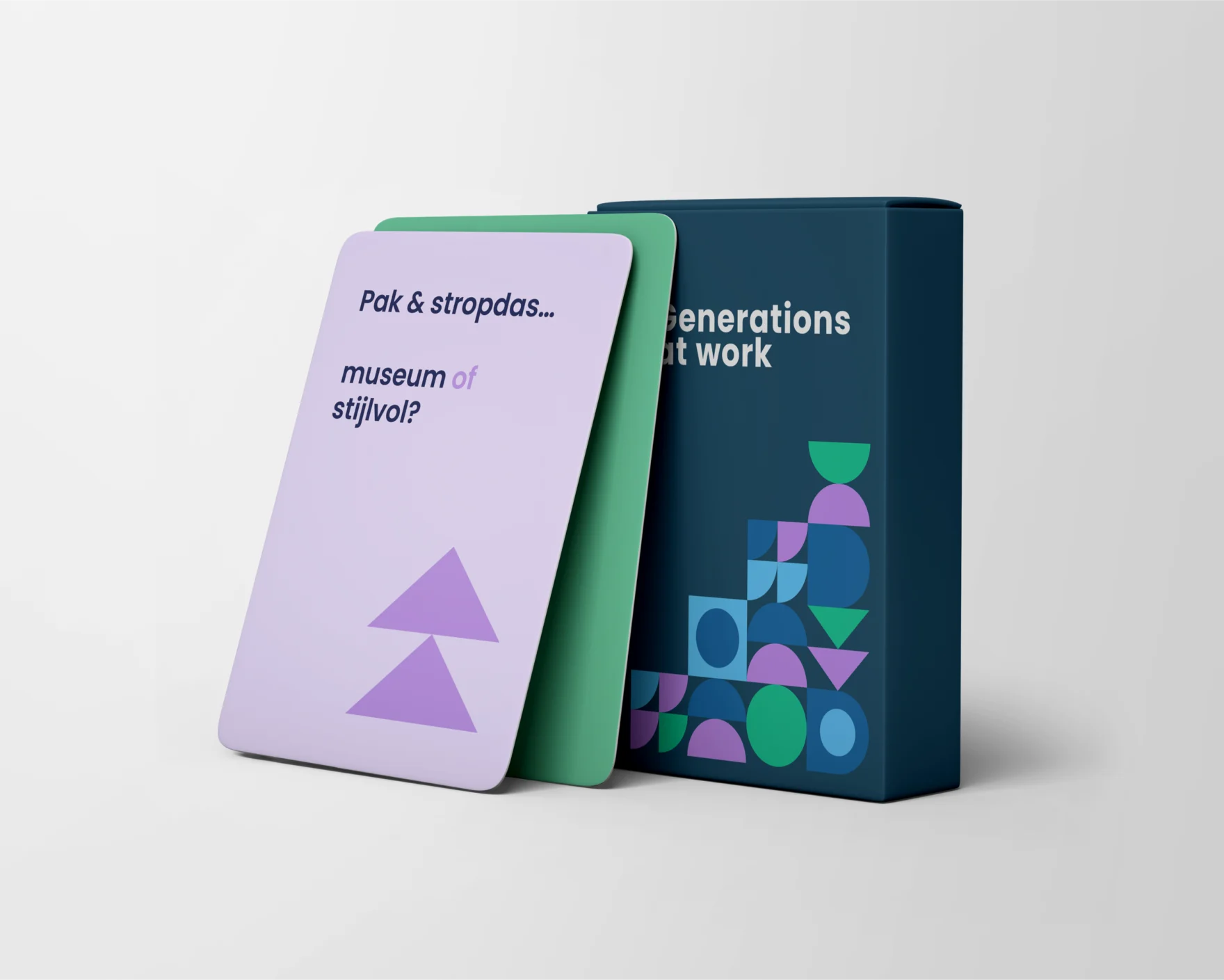 Generations at Work card game box standing next to purple and green cards