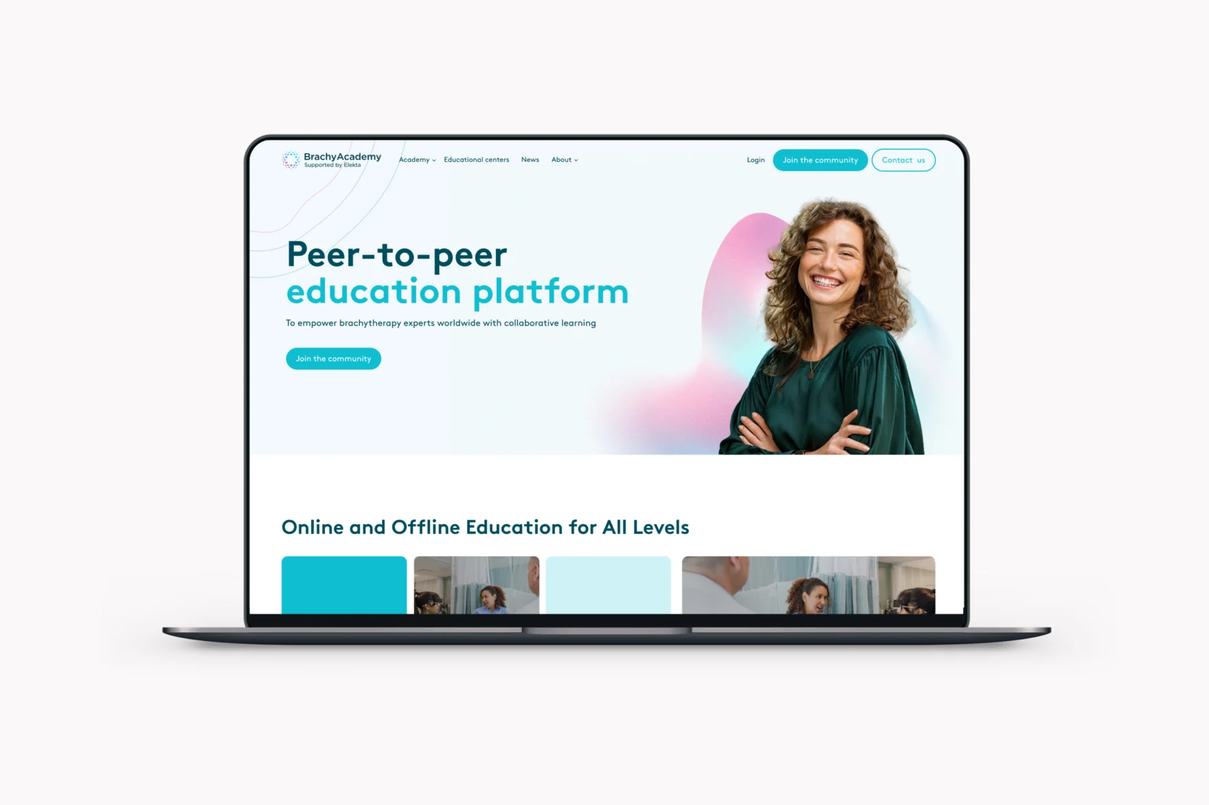 Laptop showing the BrachyAcademy homepage with the peer-to-peer education platform headline