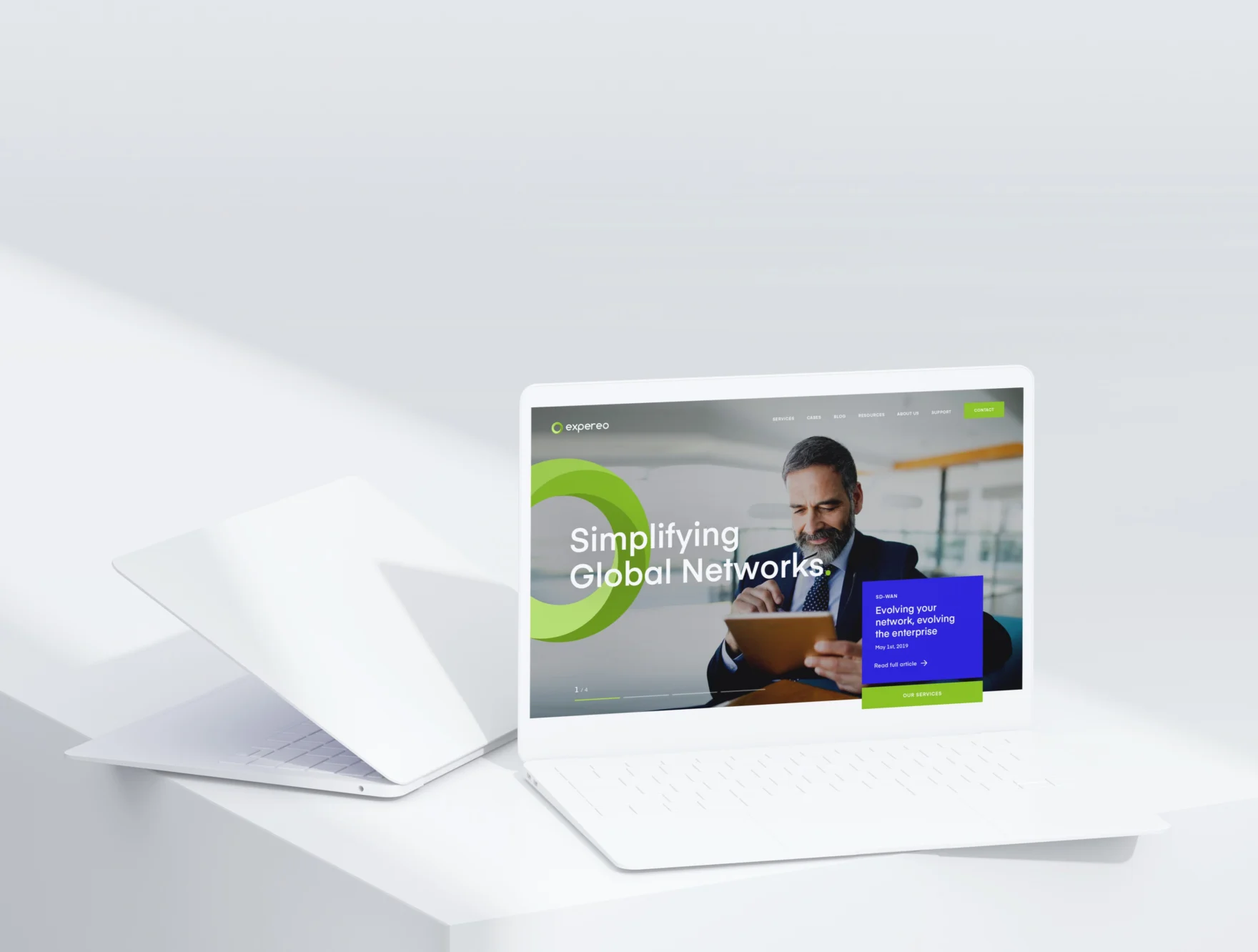 Expereo homepage design on a laptop screen with the Simplifying Global Networks headline