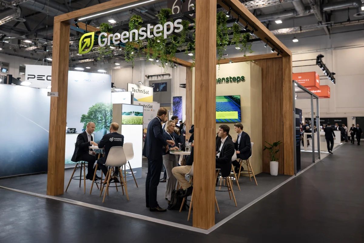 Greensteps exhibition booth with wooden frame at a trade show