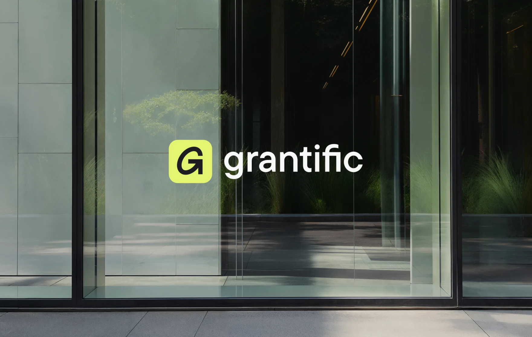Grantific logo displayed on a glass office entrance